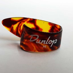 Mostrar informações para Palheta Individual de polegar Jim Dunlop SHELL M  Imagem de Palheta Individual de polegar Jim Dunlop SHELL M